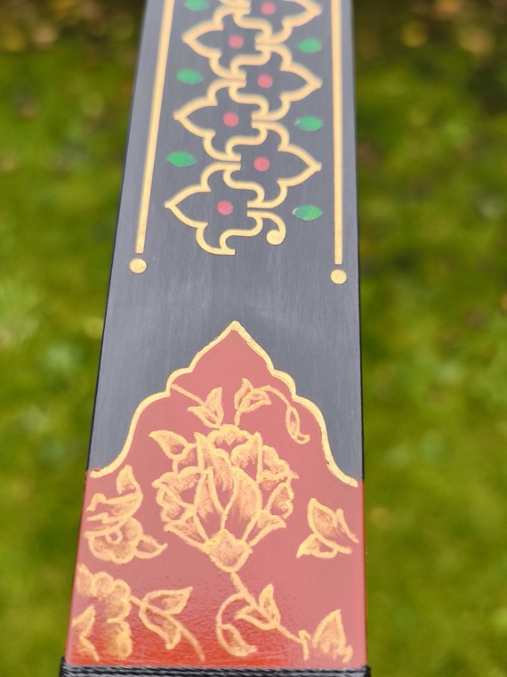 Khan, cartouche and floral panel