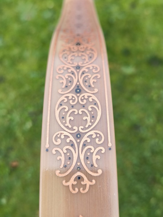 Raider, limb back with floral decoration